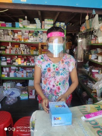 DKT International; A pharmacy owner in Yangon, stocking DKT condoms